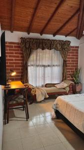 Letto o letti in una camera di Casa Amaru