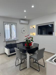 Гостиная зона в La maison guest house