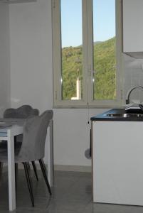 Nespecifikovaný výhled na hory nebo výhled na hory při pohledu z apartmánu + 2 fotografie