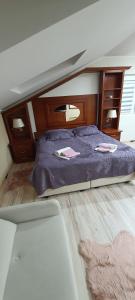 Ένα ή περισσότερα κρεβάτια σε δωμάτιο στο Lena 5 Apartmants