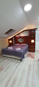 Ένα ή περισσότερα κρεβάτια σε δωμάτιο στο Lena 5 Apartmants