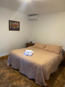 Postel nebo postele na pokoji v ubytování La Casa de Carlitos