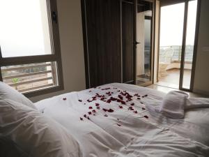 Kama o mga kama sa kuwarto sa Appartement vue océan