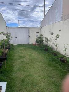 Κήπος έξω από το Casa alugar em Ibaté