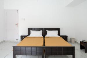 Katil atau katil-katil dalam bilik di Avanthi Homestay