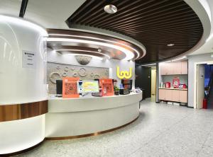 Fotografie z fotogalerie ubytování Wohkoon者行孙青年酒店北京南站店 v Pekingu