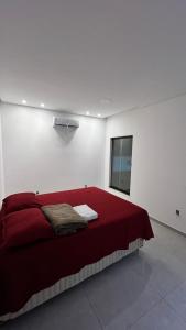 Postel nebo postele na pokoji v ubytování Casa Ampla com Piscina e Área de Churrasco 400A