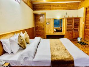 Postelja oz. postelje v sobi nastanitve The Vashisht, Manali - A Four Star Luxury Hotel