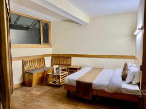 Postelja oz. postelje v sobi nastanitve The Vashisht, Manali - A Four Star Luxury Hotel