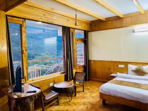 Postelja oz. postelje v sobi nastanitve The Vashisht, Manali - A Four Star Luxury Hotel