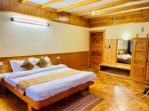 Postelja oz. postelje v sobi nastanitve The Vashisht, Manali - A Four Star Luxury Hotel