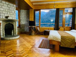 Voodi või voodid majutusasutuse The Vashisht, Manali - A Four Star Luxury Hotel toas