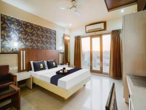 Postel nebo postele na pokoji v ubytování Hotel Tela Suite Near IGI Airport Delhi