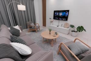 Televiisor ja/või meelelahutuskeskus majutusasutuses Taiping Homestay 5R3B, 9mins - Zoo & Lake Garden Taiping