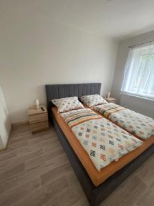 Postel nebo postele na pokoji v ubytování Apartmány Ferie