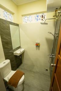 Koupelna v ubytování Yuwono Hotel & Villa Malioboro