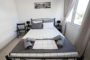 Ένα ή περισσότερα κρεβάτια σε δωμάτιο στο Boheme House in Kalamata