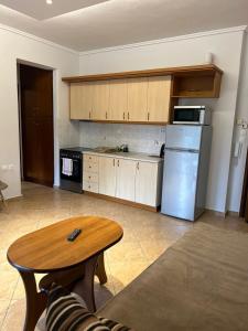 Kuchyňa alebo kuchynka v ubytovaní Eleonas Apartments