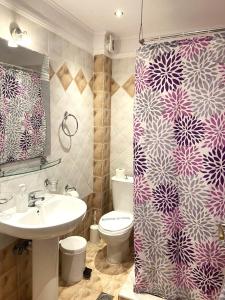 Kúpeľňa v ubytovaní Eleonas Apartments + 37 fotografií