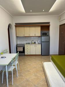 Kuchyňa alebo kuchynka v ubytovaní Eleonas Apartments