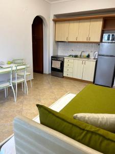 Kuchyňa alebo kuchynka v ubytovaní Eleonas Apartments