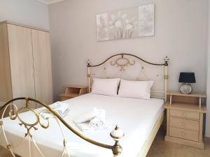 Posteľ alebo postele v izbe v ubytovaní Eleonas Apartments