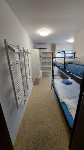 Postel nebo postele na pokoji v ubytování Apartmány Antonínov