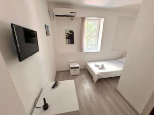 TV a/nebo společenská místnost v ubytování Hotel Istanbul