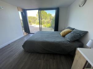 Postel nebo postele na pokoji v ubytování La matelloise