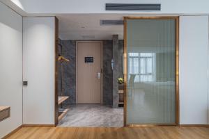 תמונה מהגלריה של Poltton International Apartment - Guangzhou Panyu Government Affairs Center בXuwen