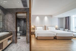 תמונה מהגלריה של Poltton International Apartment - Guangzhou Panyu Government Affairs Center בXuwen