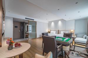 תמונה מהגלריה של Poltton International Apartment - Guangzhou Panyu Government Affairs Center בXuwen