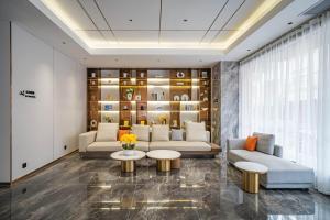 תמונה מהגלריה של Poltton International Apartment - Guangzhou Panyu Government Affairs Center בXuwen