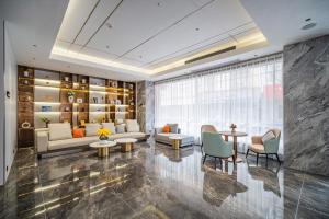 תמונה מהגלריה של Poltton International Apartment - Guangzhou Panyu Government Affairs Center בXuwen