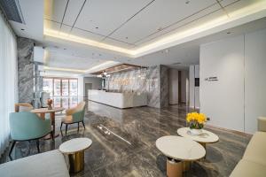 תמונה מהגלריה של Poltton International Apartment - Guangzhou Panyu Government Affairs Center בXuwen
