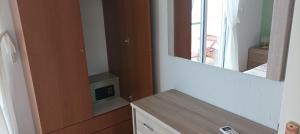 A kitchen or kitchenette at George & Katerina Houses