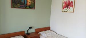 A bed or beds in a room at George & Katerina Houses