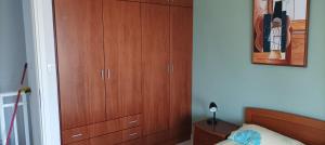 A bed or beds in a room at George & Katerina Houses