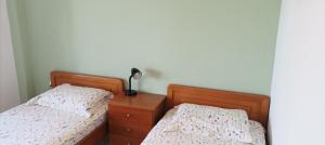 A bed or beds in a room at George & Katerina Houses