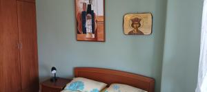 A bed or beds in a room at George & Katerina Houses