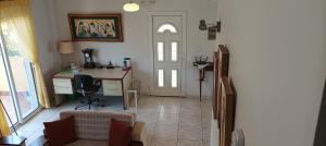 A kitchen or kitchenette at George & Katerina Houses