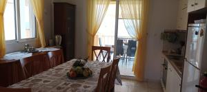 A kitchen or kitchenette at George & Katerina Houses