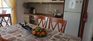 A kitchen or kitchenette at George & Katerina Houses