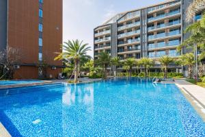 Bazén v ubytovaní Sanya Haitang Bay Muyu Time Seaview Apartment alebo v jeho blízkosti