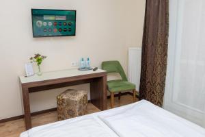 Postel nebo postele na pokoji v ubytování Hotel Nordhausen