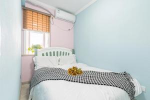 Postel nebo postele na pokoji v ubytování Cloud & Sea Boutique Apartment