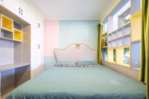 Postel nebo postele na pokoji v ubytování Cloud & Sea Boutique Apartment