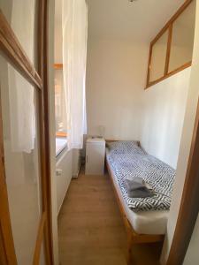 Posteľ alebo postele v izbe v ubytovaní Apartmány Johanka