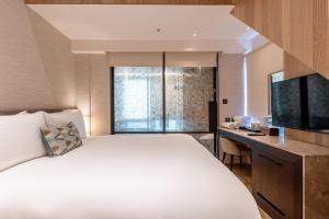 Μια τηλεόραση ή/και κέντρο ψυχαγωγίας στο Kilin Hotel, JiaoXi