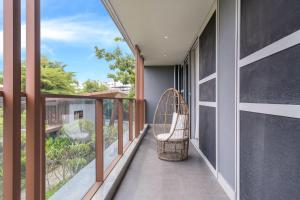 Balkón alebo terasa v ubytovaní Sanya Haitang Bay Muyu Time Seaview Apartment